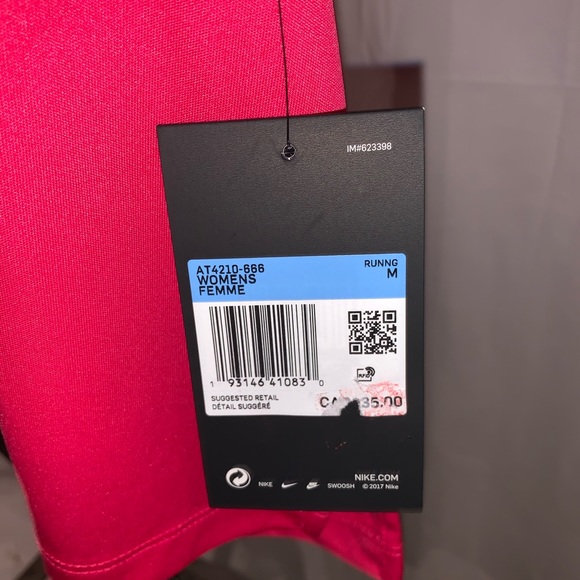 Nike Running Dri-Fit Razorback Tank Top in Pink - Picture 4 of 7